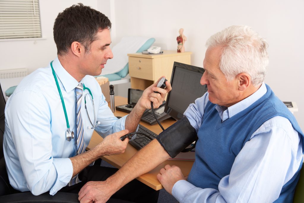 NHS doctor with patient